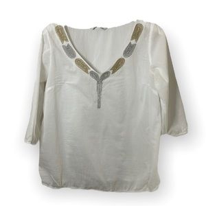 Women’s white size medium quarter sleeved shirt with gold and Silver embroidery